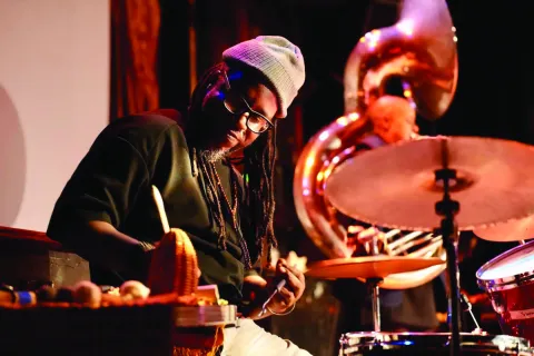 JahSun playing the drums